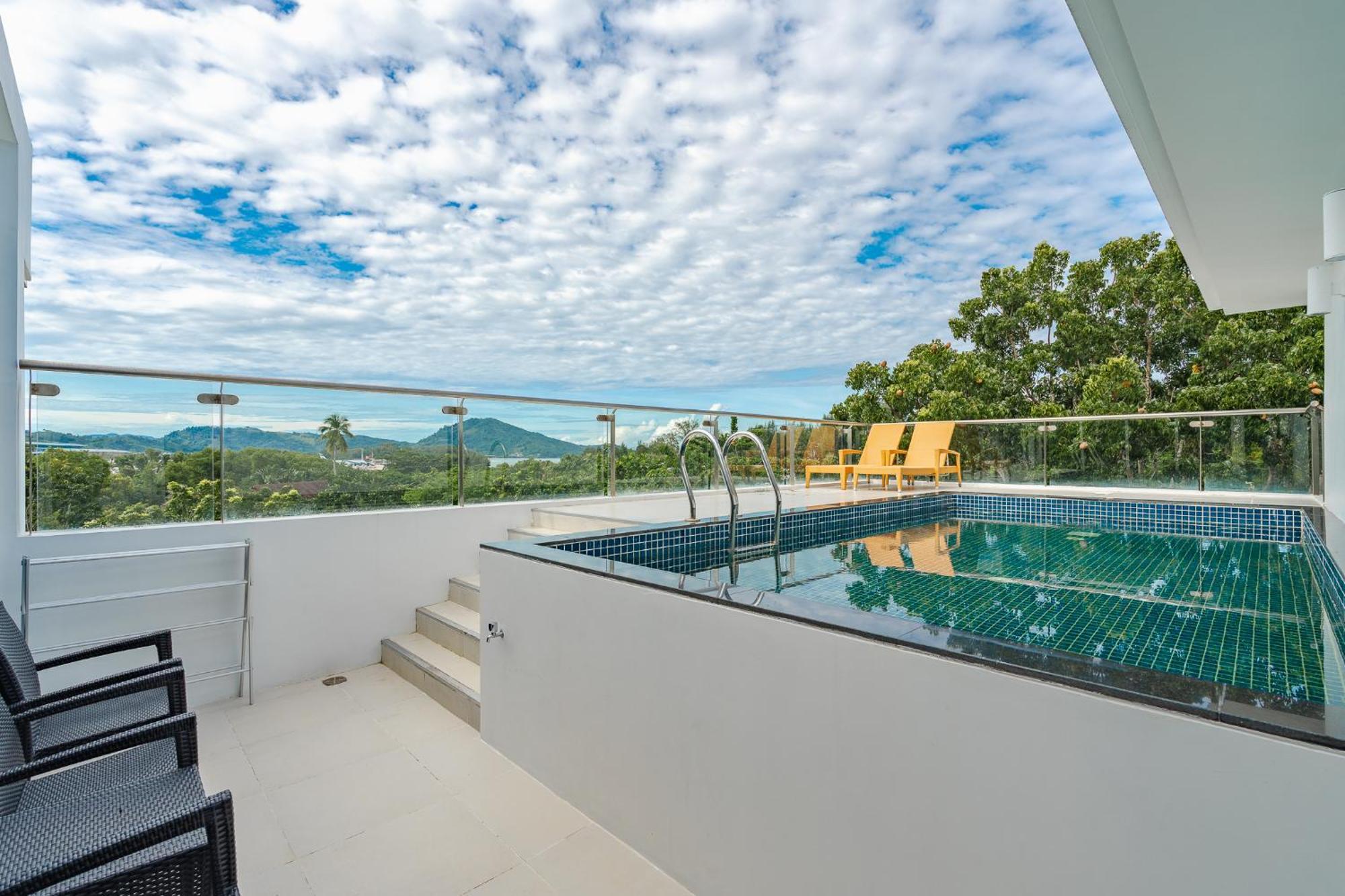 Splash Beach Resort, Maikhao Phuket - Sha Extra Plus Mai Khao Exterior photo The rooftop pool at the hotel
