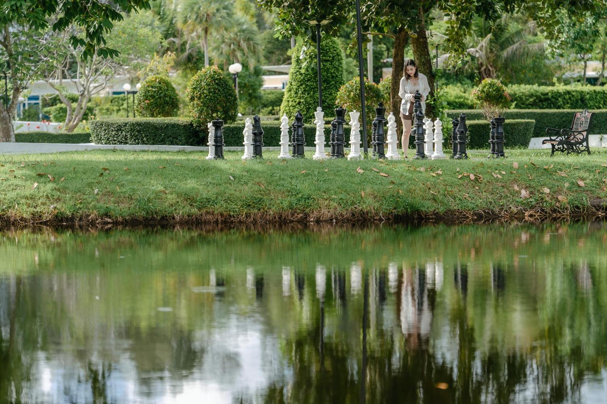 Splash Beach Resort, Maikhao Phuket - Sha Extra Plus Mai Khao Exterior photo The pond at the center of the park